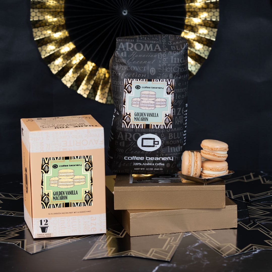 Coffee beanery packaging with coffee bags and macarons on a decorative background