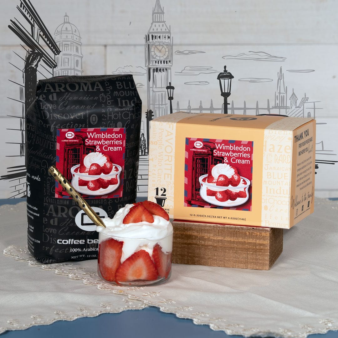 Strawberries and cream dessert with coffee bag and box in front of a London-themed backdrop
